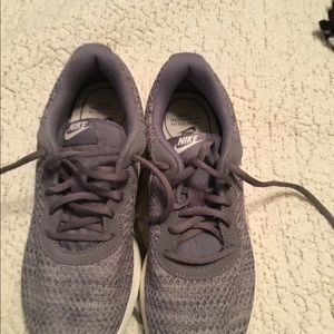 Nike tennis shoes no rips no holes.